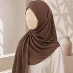 Add a warm and sophisticated touch to your modest wardrobe with our Chestnut Brown Georgette Hijab. This rich earthy shade creates an elegant and refined look, making it a beautiful choice for neutral styling, classic outfits, and effortless everyday elegance. Product Details Material: Premium Georgette Color: Chestnut Brown Size: 70 × 29 inches Fabric Type: Georgette Style: Plain Hijab Suitable For: Casual, Work & Formal Wear Chestnut Brown Georgette Hijab for women in Pakistan by hayahue