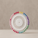 Hijab pin wheel organizer showing mixed color pins for everyday use